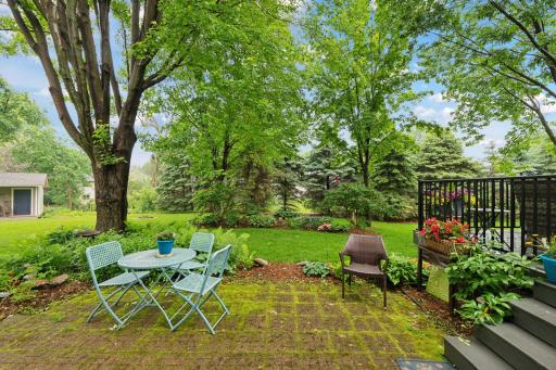 Second outdoor space with potting shed or play house.