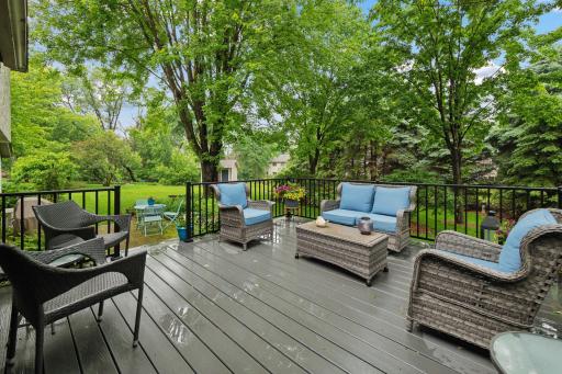 Maintenance free decking and railings for ease directly off the kitchen sliding doors.