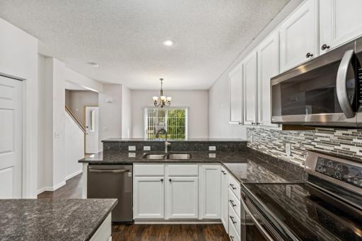 Updated kitchen with newer stainless steel appliances