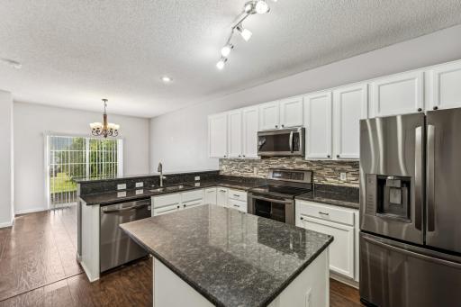 Updated kitchen with newer stainless steel appliances