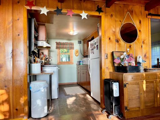This is still inclusive to the living and dining room area but closed off enough to still feel like you have your own space to cook.