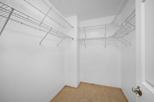 Amazing walk in closet with new shelving and abundant space to keep you organized!