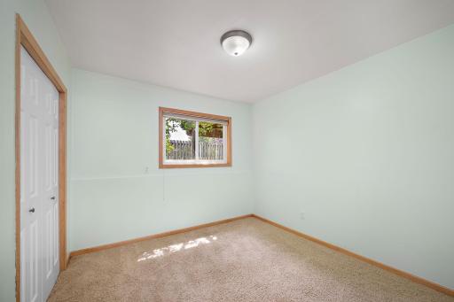 Lower Level 4th bedroom with natural light and a great closet with new shelving!
