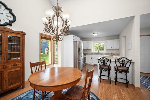 The charming, informal dining area makes this kitchen an inviting place for family meals and togetherness!