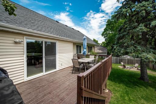 Large deck off of upper level living room is perfect for outdoor living!