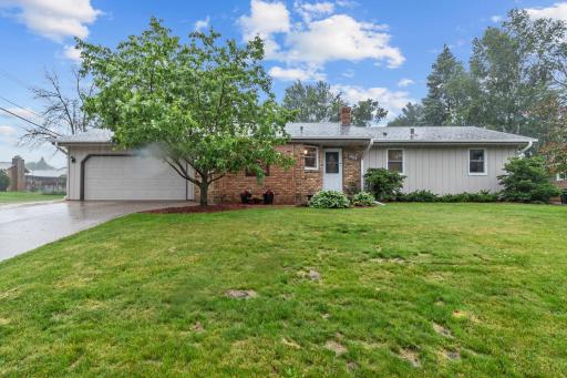 Peaceful curb appeal on a tree-lined street in an established Maplewood neighborhood.