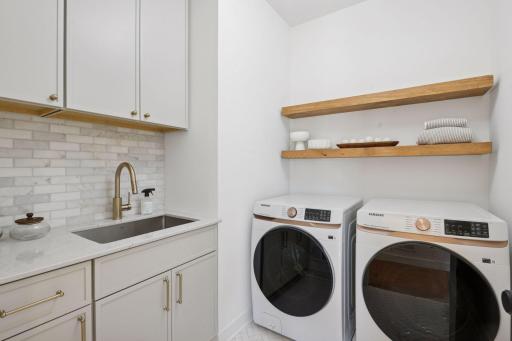 4404 West 58th Street - Upper Level Laundry Room with Stylish Designer Tile Finishes.jpg