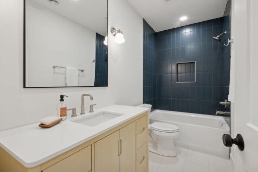 4404 West 58th Street - Lower Level Full Bath with Custom Tilework.jpg