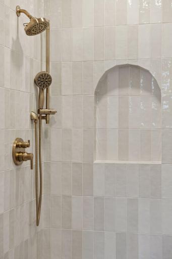 4404 West 58th Street - Primary Shower Custom Arched Niche Showcase.jpg