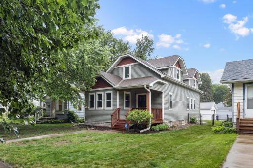 Charming Curb Appeal – Welcoming front elevation with timeless 1925 architecture and mature landscaping.