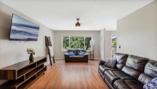 This living area offers a perfect blend of comfort and functionality for everyday living and entertaining.
