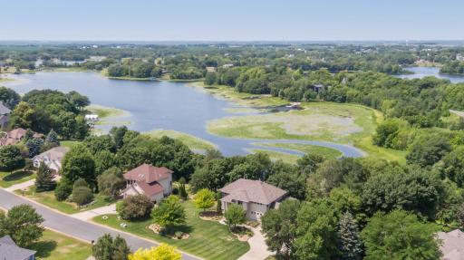 Nestled on a .87 acre lot along the shores of Lake O'Dowd. Gorgeous setting and stunning home! Fish, ski...connect with lake neighbors. You can do it all here and have easy access to many metro amenities without the long drive to the lake.