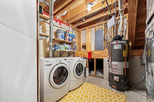 Laundry/utility room. That open crawl space goes under the whole main floor for lots of storage space.