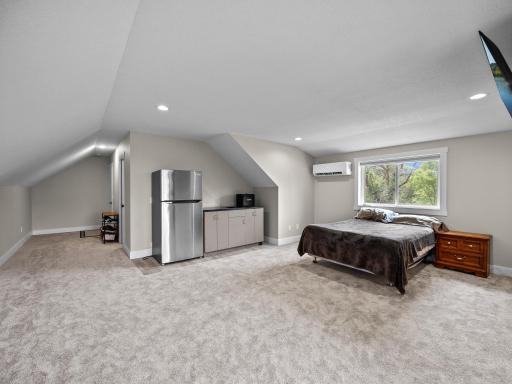 Guest suite, teen room, mother-in-law space. Refrigerator and counter keep snacks handy. Private climate control with mini-split for heat and A/C.