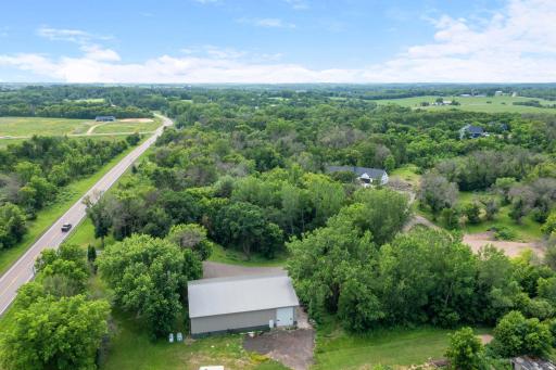 Overhead view from behind the shop building looking towards house