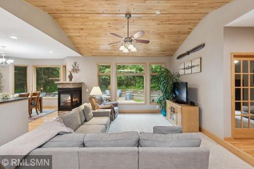 Gas fireplace can be seen by the living room, dining room and kitchen!