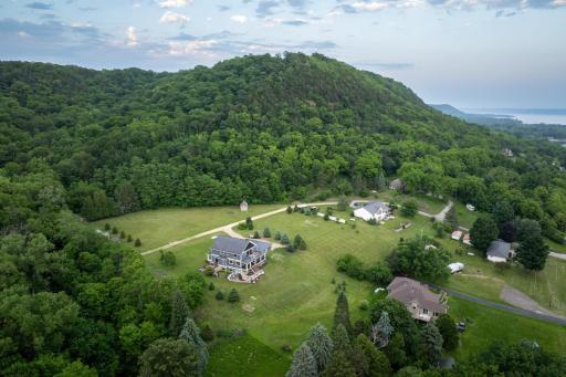 Photo for W12412 State Highway 35, Stockholm, WI 54769 - listing #6745966 View of wooded bluff land; dirt road is visible in middle of photo entering into the woods