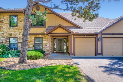 Exterior front of building - very well maintained complex. The first garage stall is included. Rental of unit allowed after 3 years of ownership.