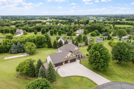 STUNNING 2.5-acre property on a quiet cul-de-sac with west-facing sunset views,