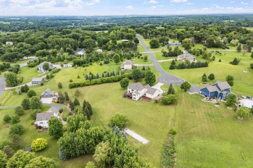 STUNNING 2.5-acre property on a quiet cul-de-sac with west-facing sunset views,