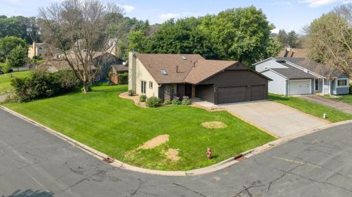 Exterior highlights include a new roof installed in 2024, a spacious heated three-car garage, and a generous corner lot offering plenty of outdoor space and privacy.