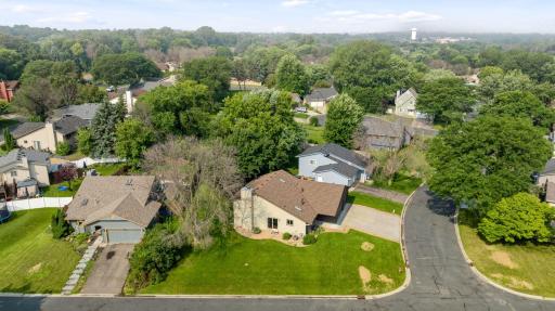 Exterior highlights include a new roof installed in 2024, a spacious heated three-car garage, and a generous corner lot offering plenty of outdoor space and privacy.
