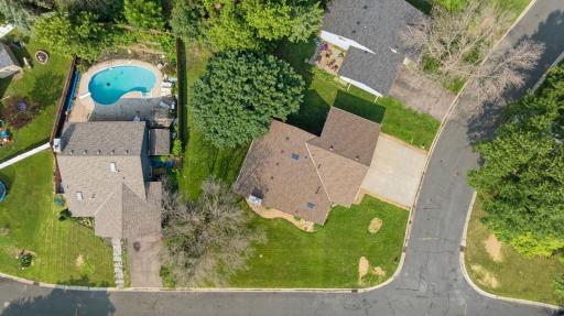 Exterior highlights include a new roof installed in 2024, a spacious heated three-car garage, and a generous corner lot offering plenty of outdoor space and privacy.
