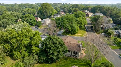 Exterior highlights include a new roof installed in 2024, a spacious heated three-car garage, and a generous corner lot offering plenty of outdoor space and privacy.