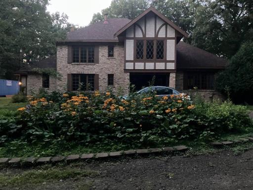 Nice exterior appeal and wraparound driveway plus 2 other driveway areas for plenty of parking for guests or if hosting retreat or for earning additional income from the bunkhouse.