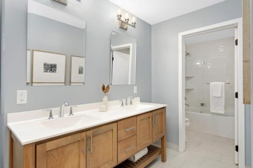 Beautiful upper level bath with dual sinks seperate from tub/shower and toilet