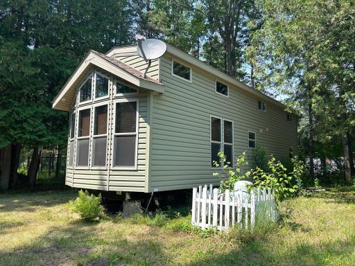 A lovely place to escape here! Mint condition 2017 park model for your seasonal use with electric, private septic & well on just under an acre lot, near Clear Lake in Glen!