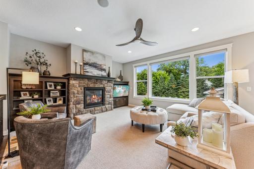 Sun-filled great room with large windows.