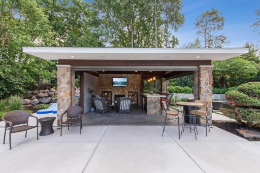 Cabana with gas fireplace and smart screens.