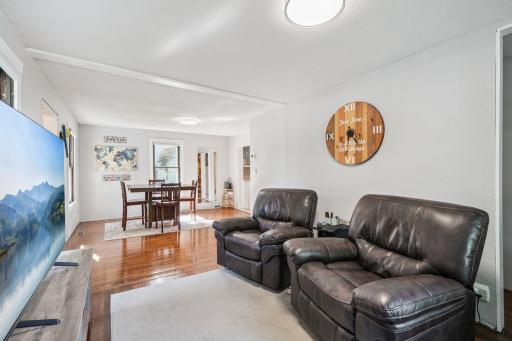 Open flow between living room and dining room