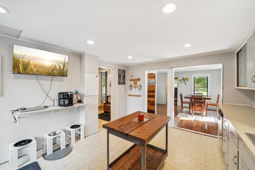 Kitchen with view to dining area and entry
