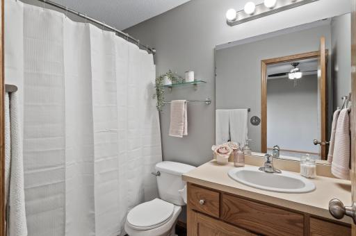 Primary bathroom has a tub/shower combo.