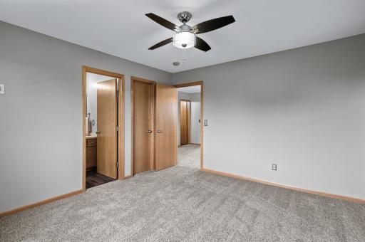 Primary suite includes a walk in closet and private full bathroom.