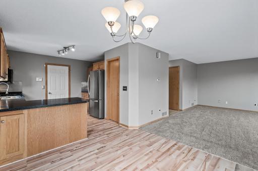 A breakfast bar and walk-in pantry are a great addition to any kitchen.