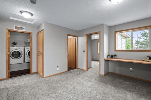 Also upstairs is the laundry room & full bathroom.