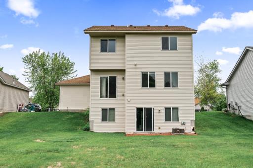 View of the back of the house that is just waiting for you to design your ideal deck.