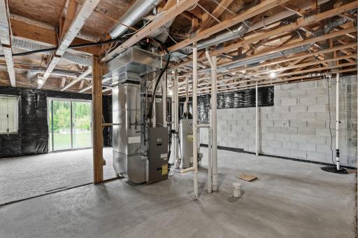 The l sounds like an unfinished lower level walks out to the backyard. Plenty of room to add another bedroom, living room and bathroom.