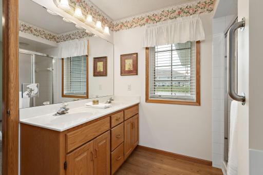 Two side-by-side sinks in the primary bath as well!