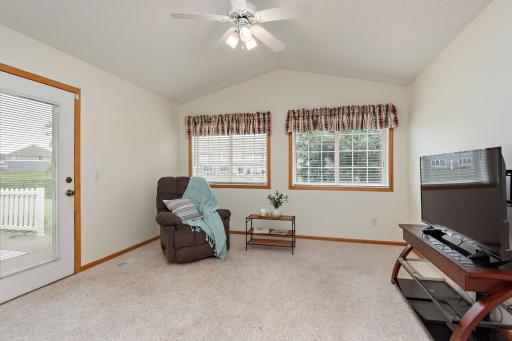Sunroom with access to patio and view of the pond!