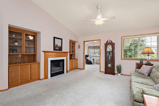 Gorgeous fireplace and built in bookshelves.