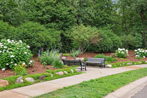 Beautiful seating area in this lovely neighborhood.