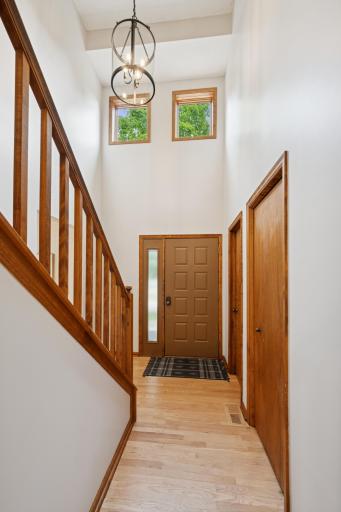 The 2-story foyer is warm and inviting. The entire main level's hardwood floors were recently refinished and make every room shine.