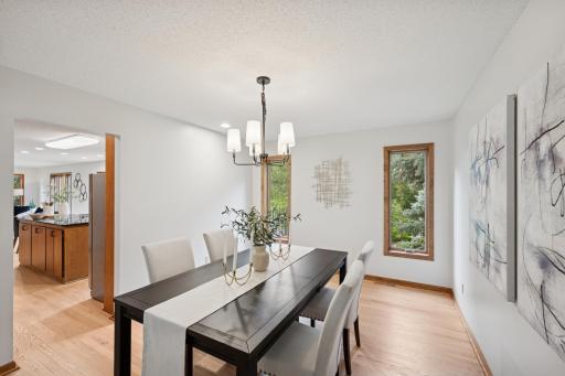 The formal dining room is perfect for hosting dinner parties.