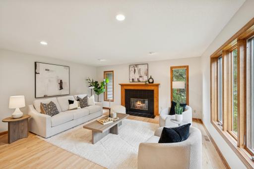 The family room has a cozy gas fireplace to gather around on those cold winter nights.