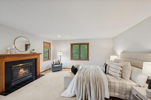 Primary suite has a gas fireplace and great view