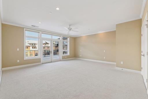 The owner's suite has it's own set of doors to the large balcony and has plenty of room for a king size bed and seating area.